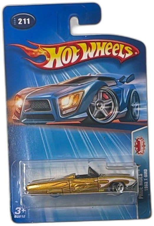 Hot Wheels Pride Rides 1963 T Bird Gold Diecast Car 2004 Planet Series New: Hot Wheels Pride Rides 1963 T-Bird Gold Diecast Car from the 2004 Planet Hot Wheels series, number 211. Features detailed gold metallic paint with custom flame graphics and is part of the Pride Rides 