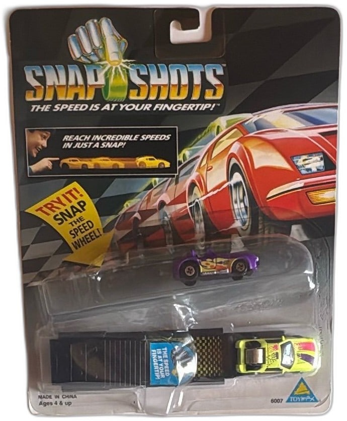 1993 Toymax Snap Shots Finger Flick Racer Set Mint On Card Diecast Car Toy: Vintage 1993 Toymax Snap Shots set with diecast cars, original packaging. Retro collectible featuring finger-powered speed launcher, includes yellow and purple cars with vibrant graphics. Toy is mint 