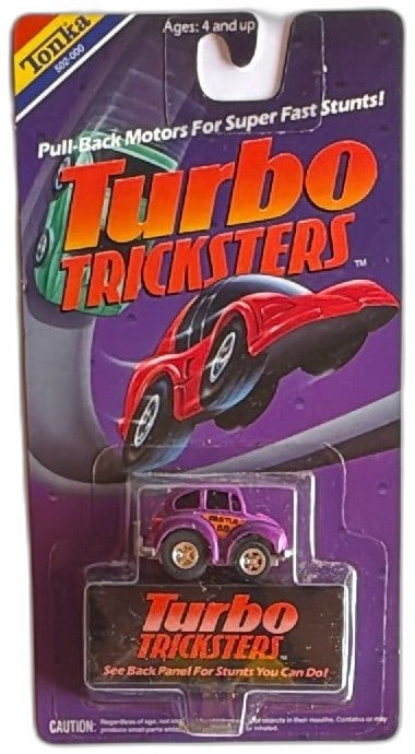 Tonka Turbo Tricksters Beetle 68 Purple Diecast Car 1989 Sealed Pull Back: Tonka Turbo Tricksters Beetle 68, vintage 1989 diecast pull-back stunt car, still sealed in original packaging. Features purple color, chrome wheels, and "Beetle 68" graphics. Pull-back motor for fast