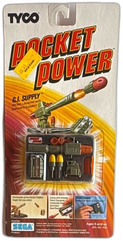 Tyco Pocket Power GI Supply Rocket Launcher Stationery Set 1988 Sega MOC: Tyco Pocket Power GI Supply Rocket Launcher with Stationery Supplies, released in 1988 and licensed by Sega. This vintage toy includes a rocket launcher ballpoint pen, grenade pencil sharpener, comman