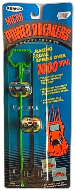 Remco Micro Power Breakers Sealed 1989 Racing Cars Set Blue and White Red: Vintage Remco Micro Power Breakers set from 1989, sealed on card. Features two authentically styled micro racing cars (one blue/white, one white/red), and green pull rack for high-speed play. Collecti