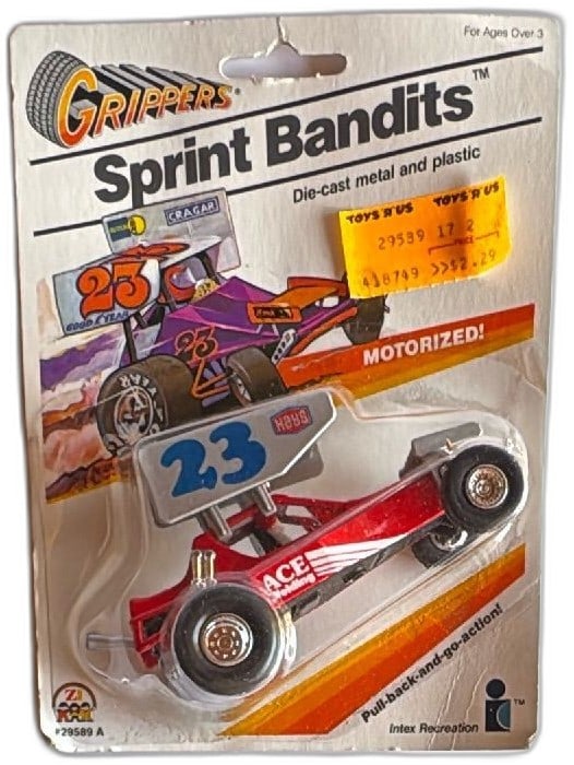 Grippers Sprint Bandits Diecast 23 Ace Racing Motorized Toy Car Intex NOS: Vintage Grippers Sprint Bandits die-cast and plastic motorized toy car by Intex Recreation, model 23 Ace Racing. Carded and factory-sealed, featuring pull-back-and-go action. Package shows some shelf 