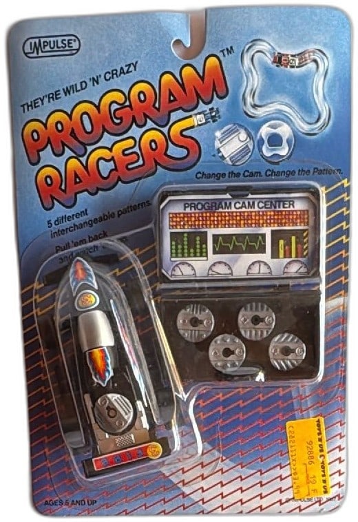 Impulse Program Racers 1987 Pull Back Car Cam Center New Sealed Vintage Toy: Vintage 1987 Impulse Program Racers pull back toy car with five interchangeable cam discs. Includes original PROGRAM CAM CENTER and unique wild pattern actions. Package is unopened and factory sealed 