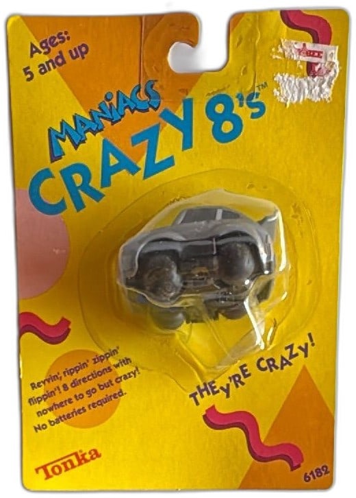 Tonka Maniacs Crazy 8s Diecast Car 1986 Silver Blue Stripes New Sealed 6182: Tonka Maniacs Crazy 8s diecast toy car, silver color with blue racing stripes, model 6182 from 1986, new and factory sealed on original yellow card. Highly collectible 1980s toy, no batteries required