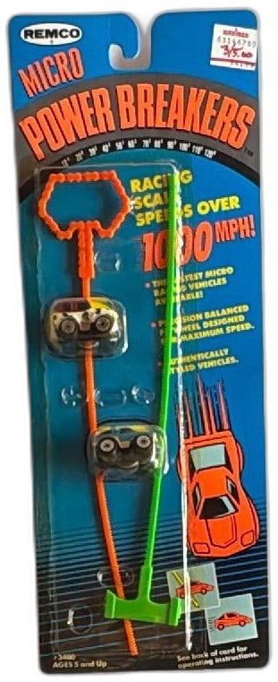 Remco Micro Power Breakers 3400 Racing Cars 1989 Sealed Vintage Pack Toy: Vintage Remco Micro Power Breakers #3400, released in 1989, mint on card. Features two micro racing vehicles with wind-up rack launchers for high-speed play. Eye-catching blister packaging, never open