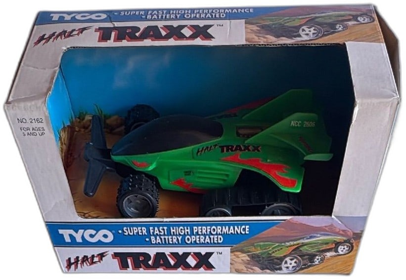 Tyco Half Traxx Battery Operated Green RC Car 1992 In Original Box Vintage Toy: Tyco Half Traxx battery operated green RC car, released in 1992, in its original box. Features include super fast high performance drive, durable plastic chassis, tracked rear wheels, and unique red a
