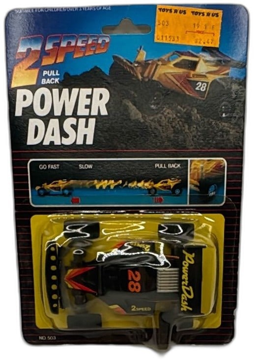 1985 Worldbond Power Dash 2 Speed Pull Back No 503 Black Yellow Sealed Carded: Vintage 1985 Worldbond Power Dash 2 Speed Pull Back Car, item No 503, in original sealed packaging. Features deep tread rubber tires, realistic spring suspension, and a powerful pull back flywheel mot