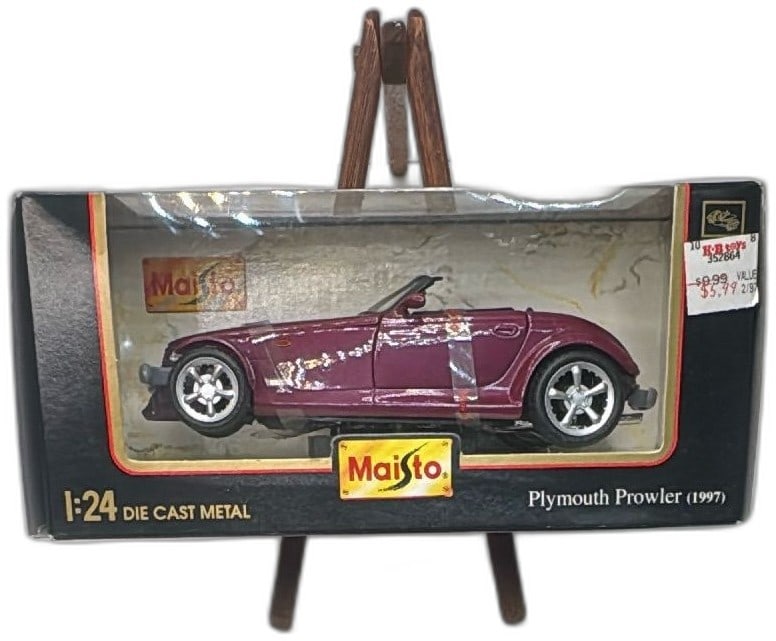 Maisto 1 24 Scale Diecast 1997 Plymouth Prowler Special Edition Purple Model: Maisto 1:24 scale diecast model 1997 Plymouth Prowler in purple, Special Edition. Detailed diecast metal with opening doors, hood, adjustable seats, movable steering. Includes original box with some s