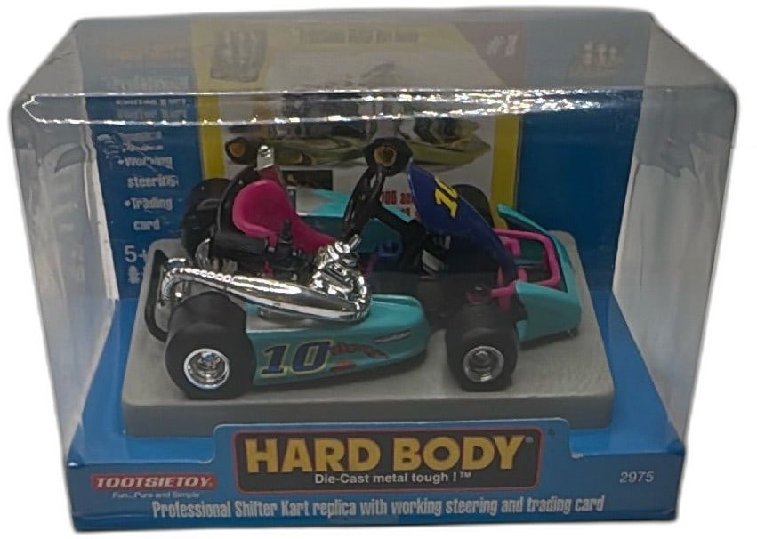 Tootsietoy Hard Body Shifter Kart Diecast Model 2975 New 1998 Blue Pink: Tootsietoy Hard Body Professional Shifter Kart die-cast replica, model 2975, made in 1998 by Strombecker Corp. Features a detailed die-cast metal body with a working steering mechanism, teal blue main