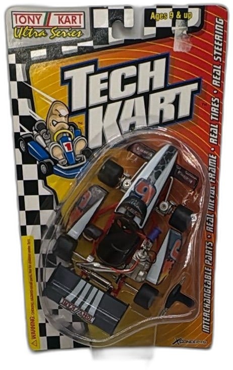 Tony Kart Ultra Series Tech Kart Diecast Go Kart X Concepts 2000 New Sealed: Tony Kart Ultra Series Tech Kart diecast collectible go kart by X Concepts, 2000. Features real metal frame, interchangeable parts, real steering, and rubber tires. This detailed miniature is modeled 