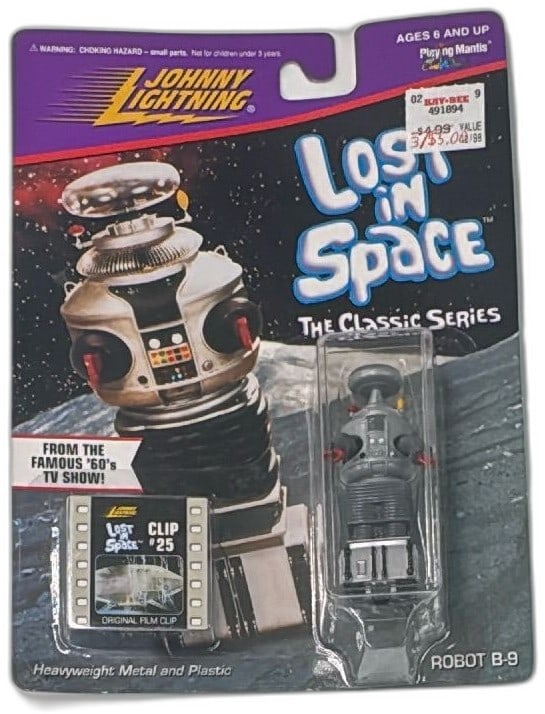 Johnny Lightning Lost In Space Classic Series Robot B-9 Diecast Film Clip 1998: Johnny Lightning Lost In Space Robot B-9 Classic Series diecast collectible with original film clip #25, released in 1998 by Playing Mantis. Features iconic Robot B-9 from the 1960s TV show, construct