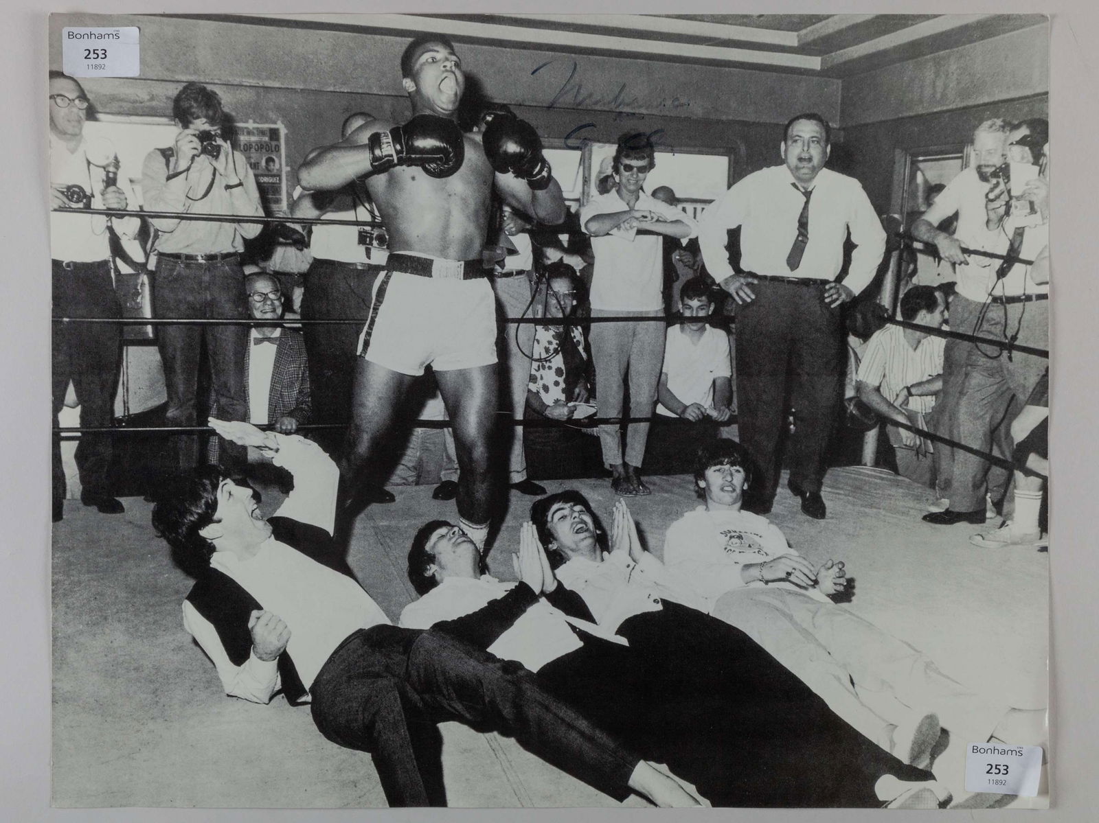 A Muhammad Ali autographed photograph (1 of 2)