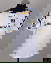 A white, orange and blue LA Galaxy short-sleeved shirt