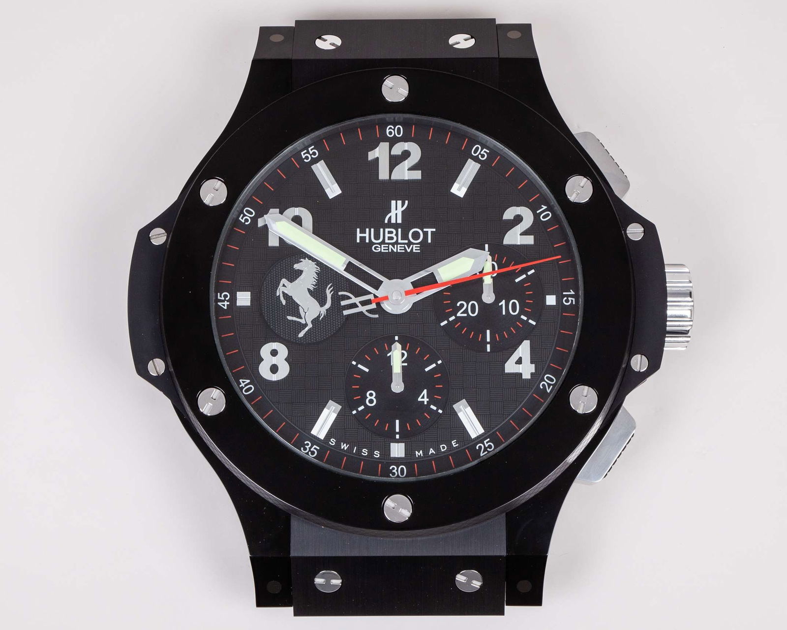 Ferrari Hublot Large Wall Clock: Ferrari Hublot Large Wall Clock. This Ferrari Hublot Large Wall Clock is an official and rare piece of automotive-themed decor, associated with two of the world’s most iconic luxury brands: Ferr
