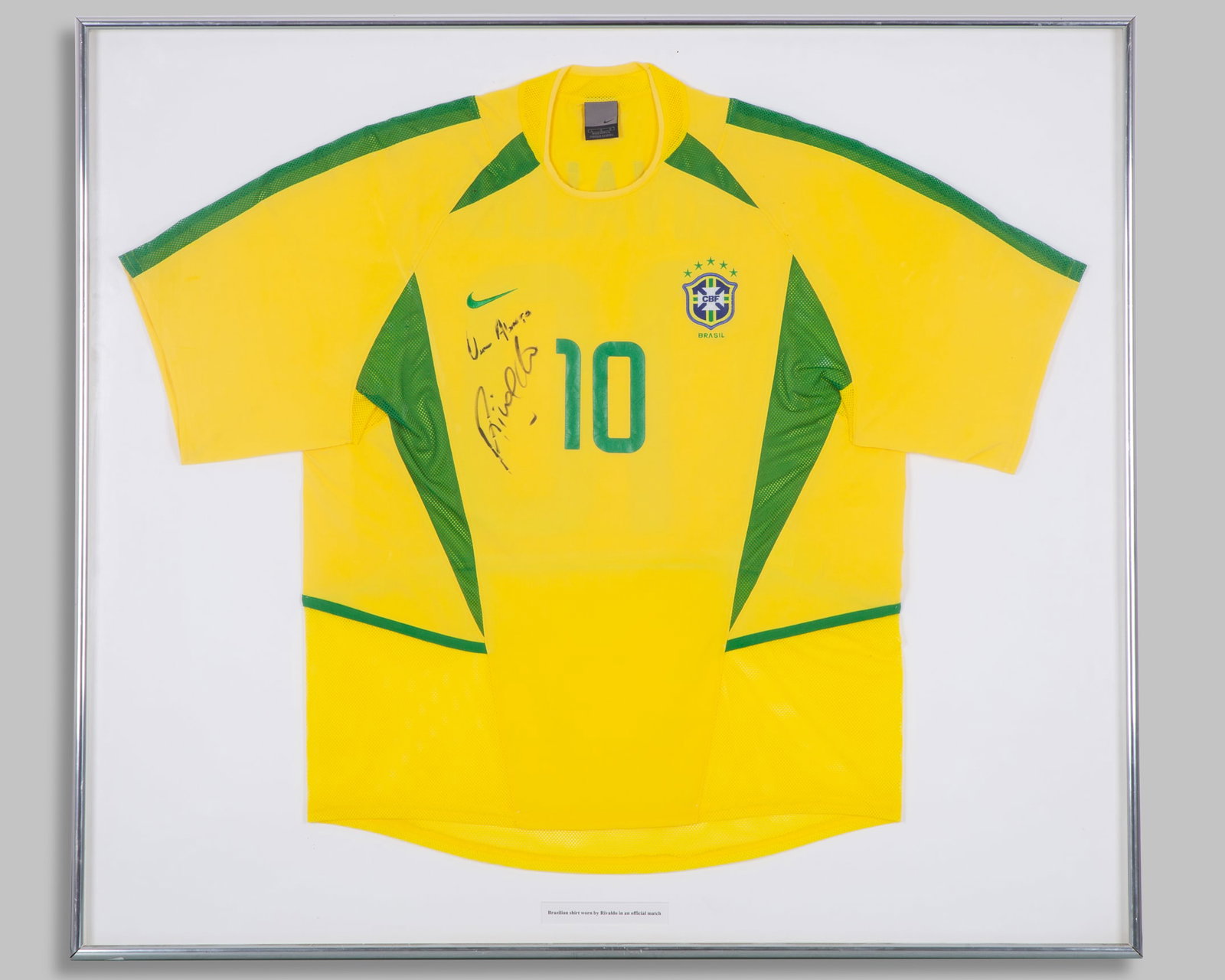 Rivaldo yellow and green No.10 Brazil autographed short-sleeved shirt, 2002-03: Rivaldo yellow and green No.10 Brazil autographed short-sleeved shirt, 2002-03, Nike, L, with crew-neck collar and embroidered cloth badge inscribed CBF BRASIL, the reverse lettered, autographed on th