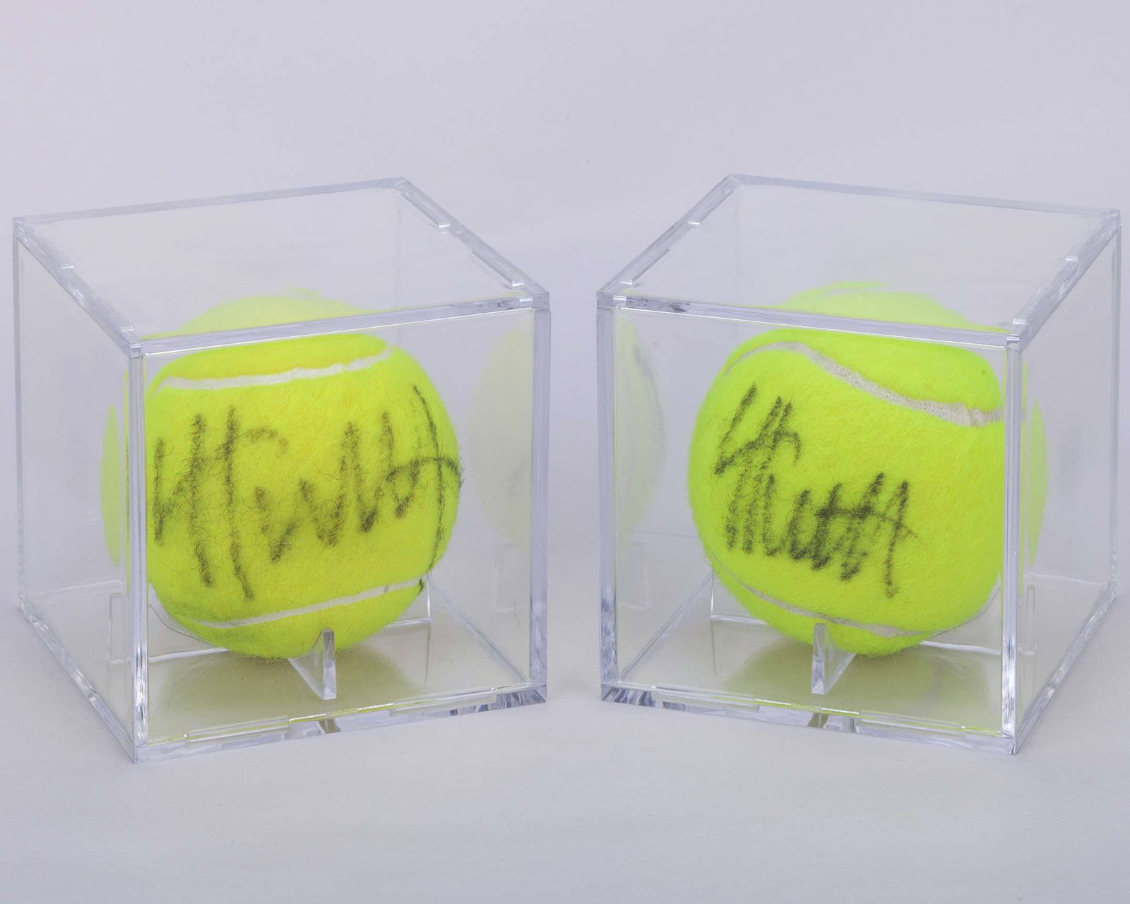 Leyton Hewitt two autographed Wimbledon tennis balls, 2011 and 2015: Leyton Hewitt two autographed Wimbledon tennis balls, 2011 and 2015, with COA from Grant Cantin former Head Groundsman at Wimbledon (2) 