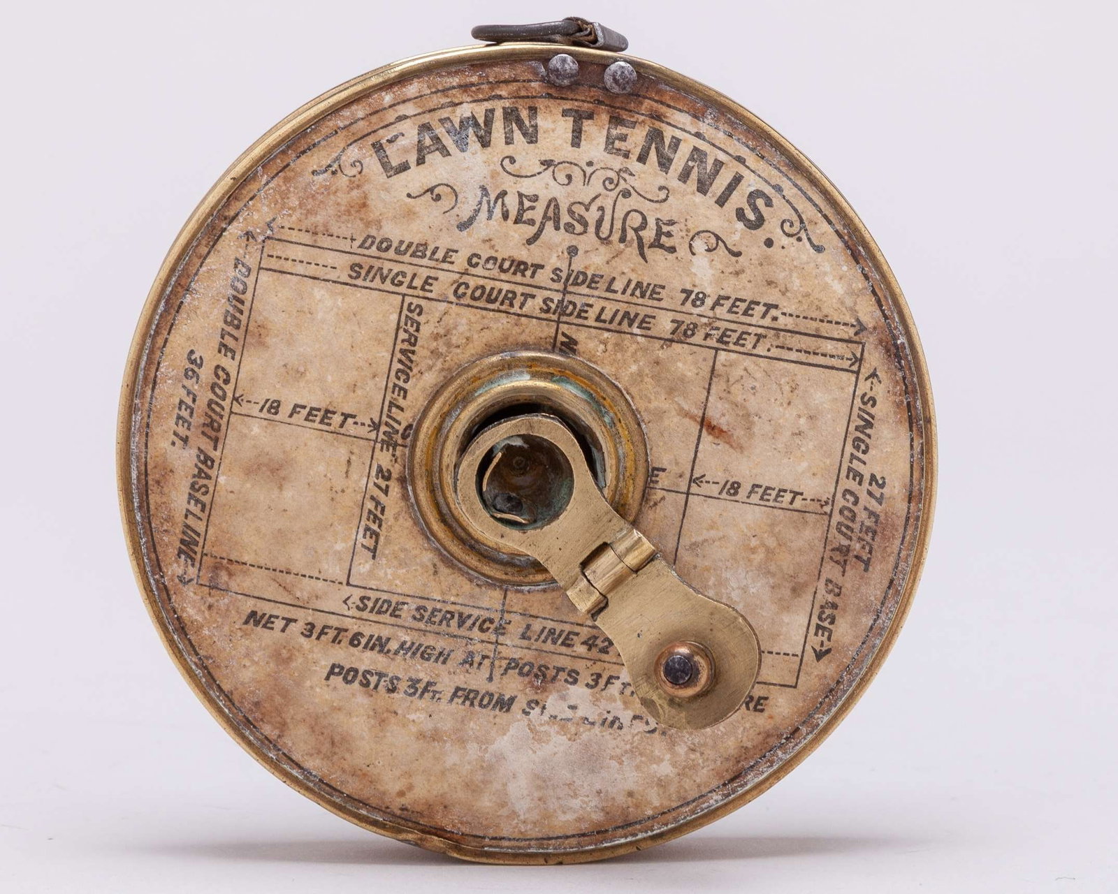An early brass Lawn Tennis measure, the face with applied label detailing the court shape - 5