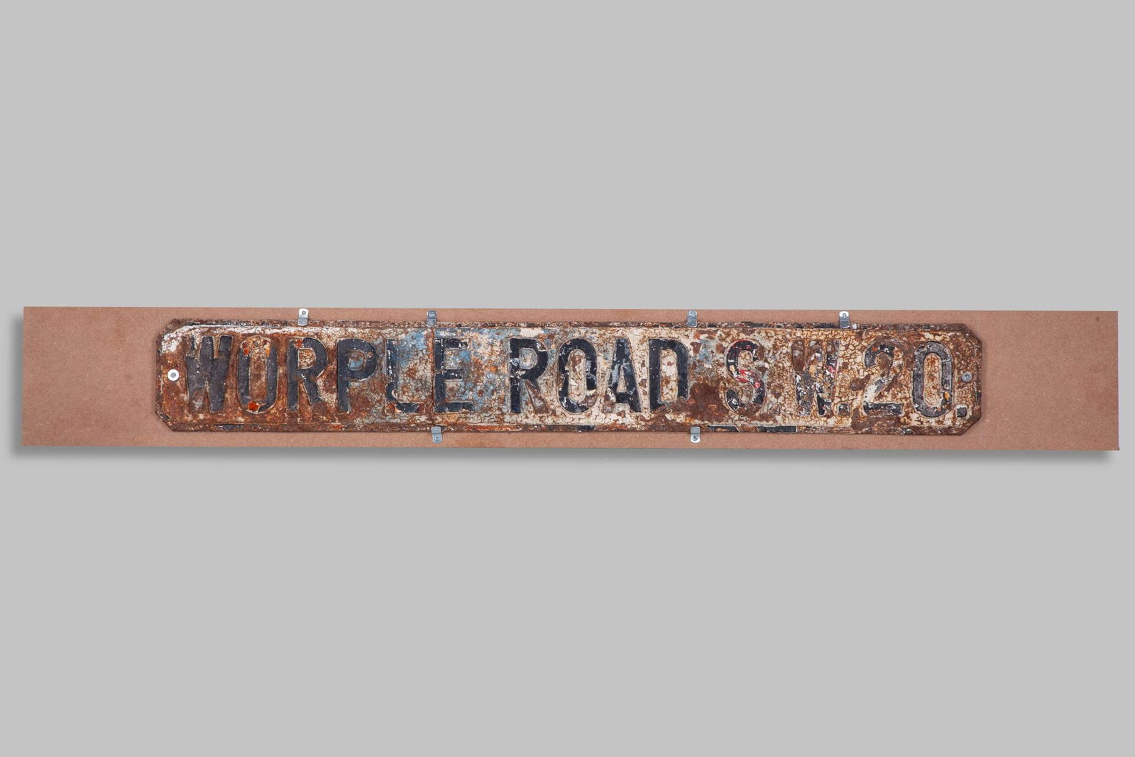 A heavy original cast iron pre First World War street sign, which reads “WORPLE ROAD S.W.20: A heavy original cast iron pre First World War street sign, which reads “WORPLE ROAD S.W.20”, this being the original address of the All England Croquet and later Lawn Tennis and Croquet C