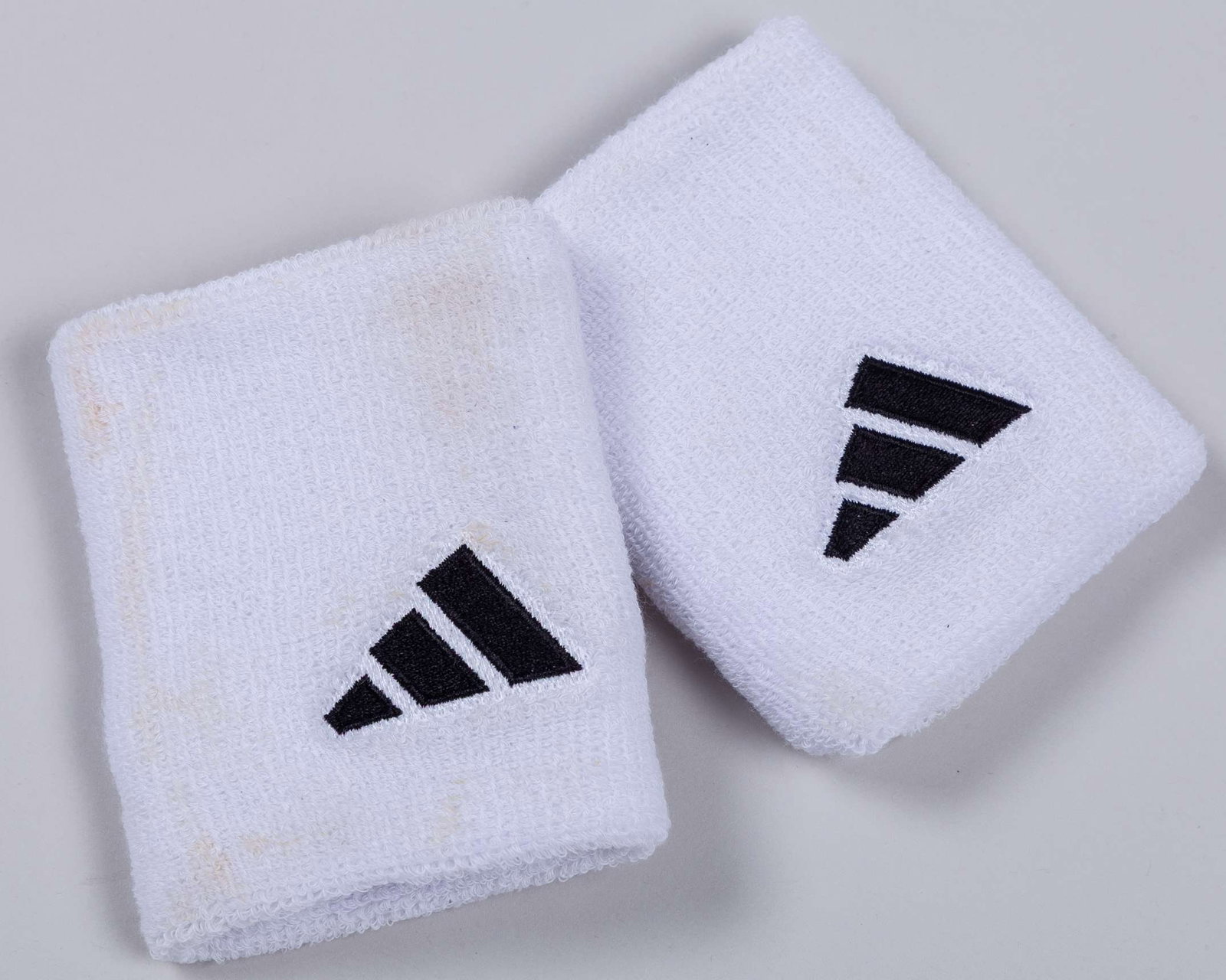 Andy Murray a pair of match worn Adidas wristbands 2012 quarter-final : Andy Murray a pair of match worn Adidas wristbands 2012 quarter-final, with COA from Grant Cantin former Head Groundsman at Wimbledon 
