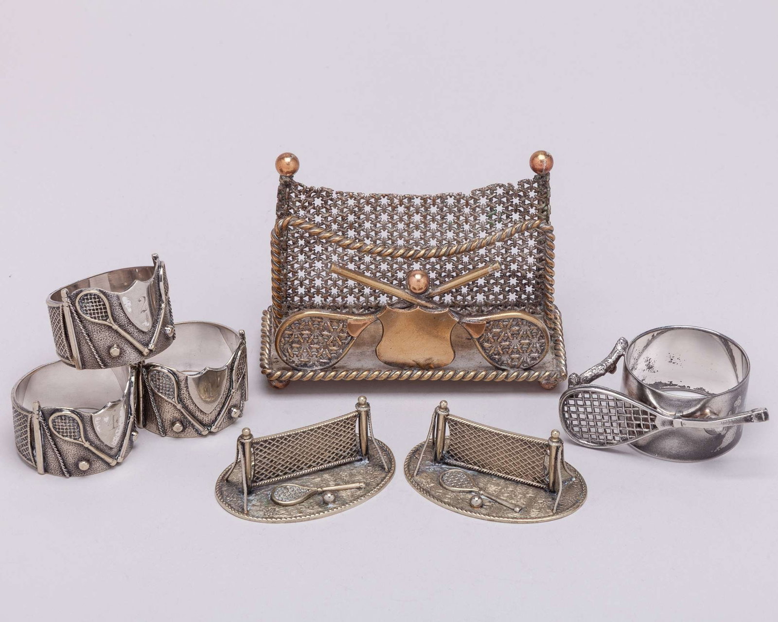 Three white-metal tennis napkin rings, each decorated with two rackets, two balls (1 of 7)