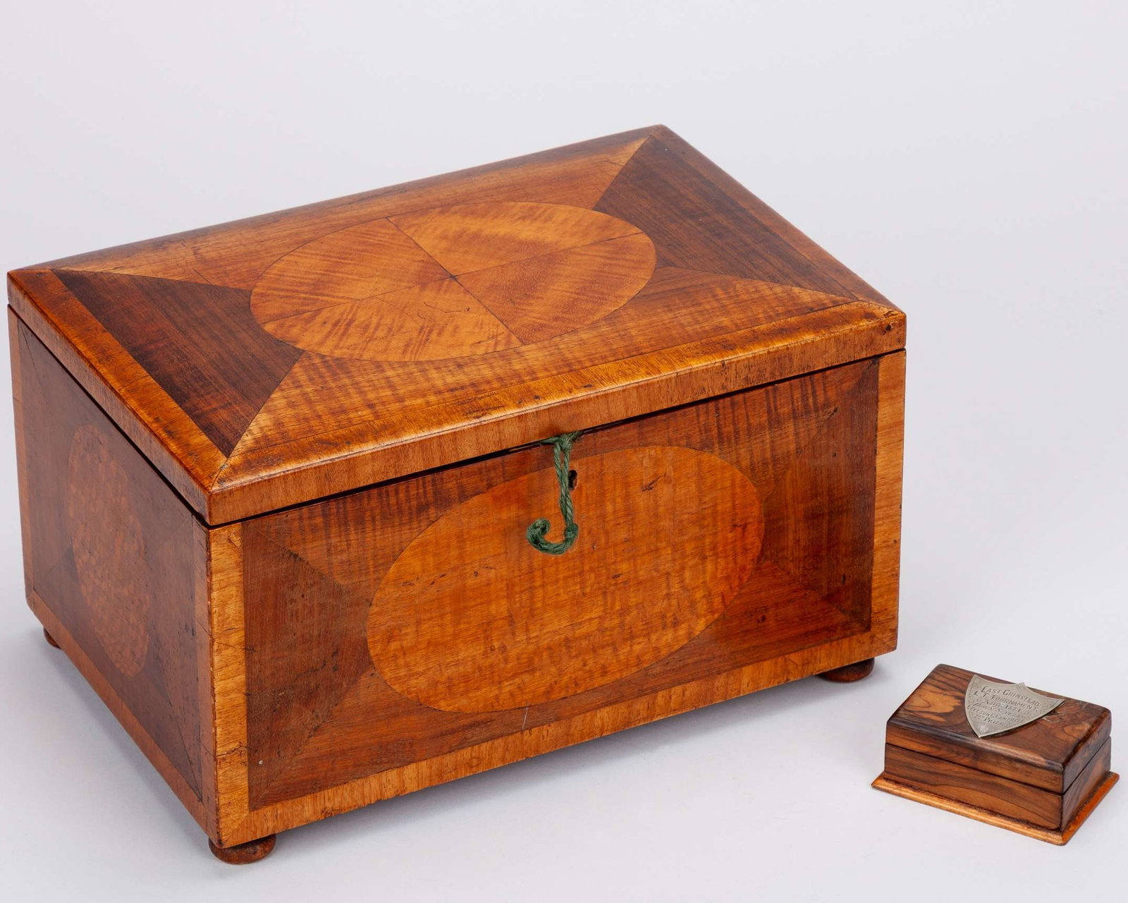 Frank Wilde a specimen wood stationary box: Frank Wilde a specimen wood stationary box with hinged lid, the underside with silver prestation plaque inscribed TO FRANK WILDE With All Good Wishes From Your Friends At Slazengers Australia. Austral
