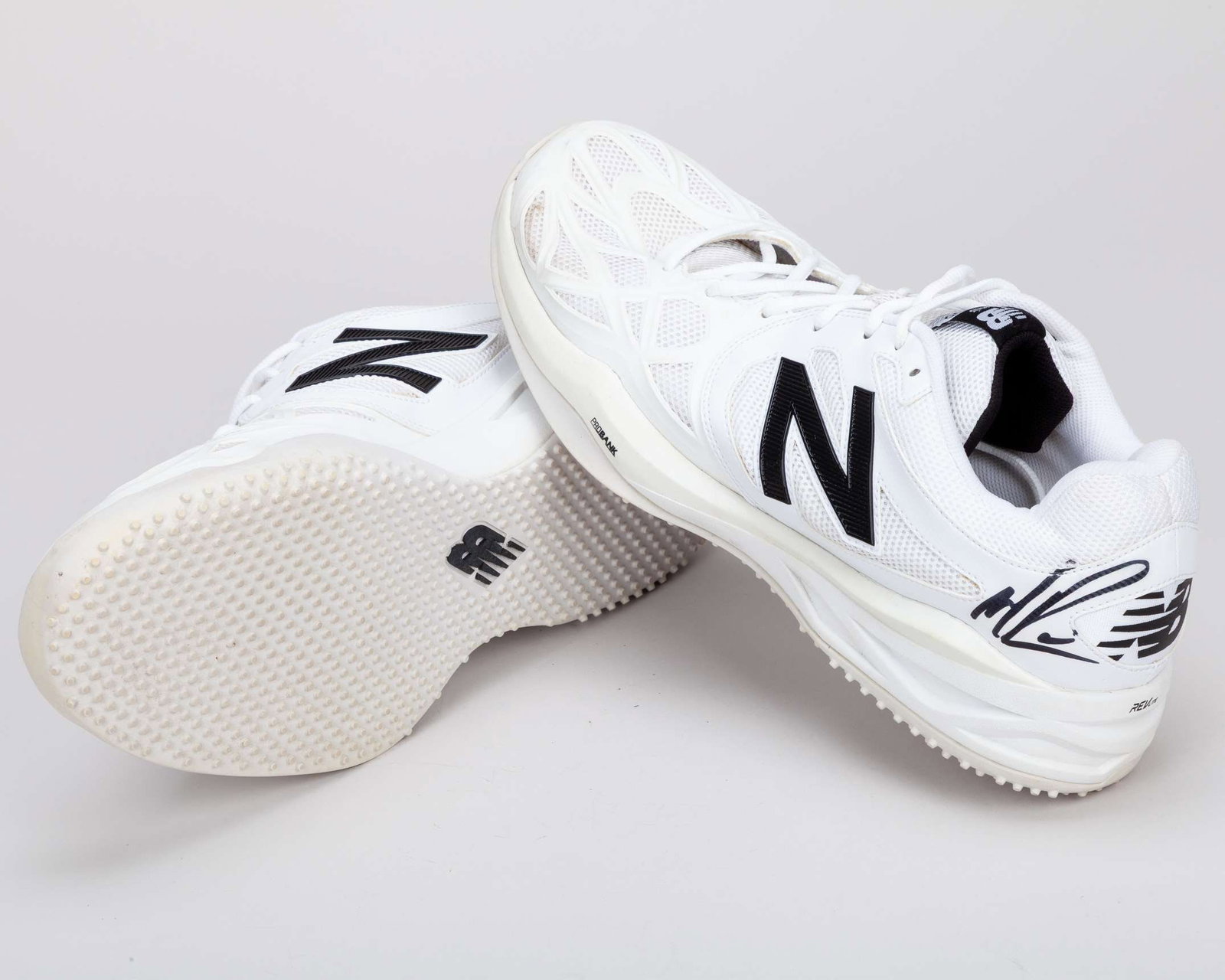 Milos Raonic pair of white and black New Balance 996 match worn tennis shoes, 2013 - 2