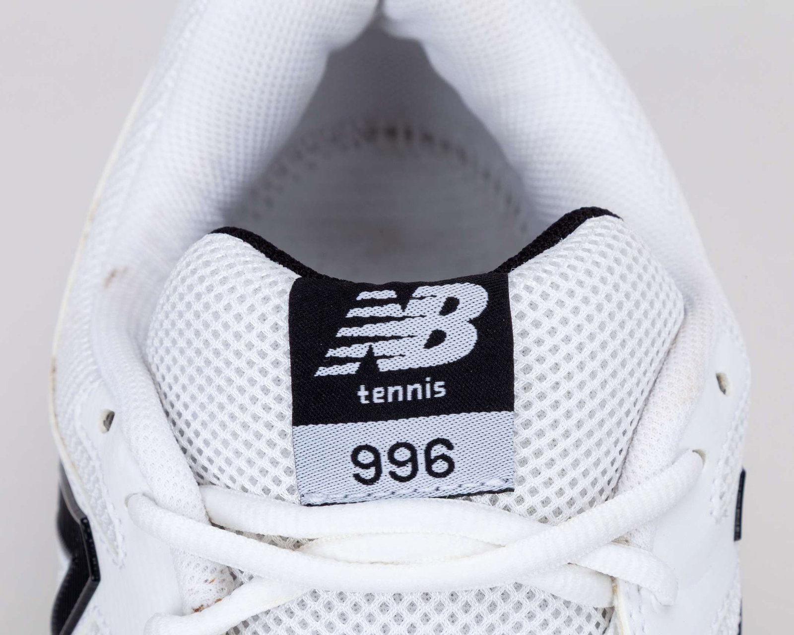 Milos Raonic pair of white and black New Balance 996 match worn tennis shoes, 2013 - 7