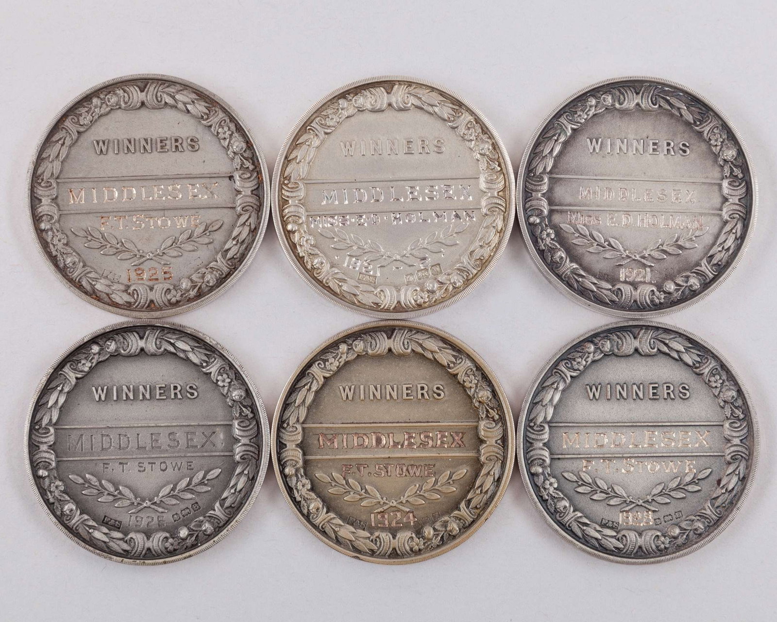 Francis Stowe four silver Men's Inter County Cup medals : Francis Stowe four silver Men's Inter County Cup winners medals, the obverse of each inscribed THE LAWN TENNIS ASSOCIATION Men's Inter County Cup, 1924, 1925, 1926 and 1928, a bronze LTA commemoration