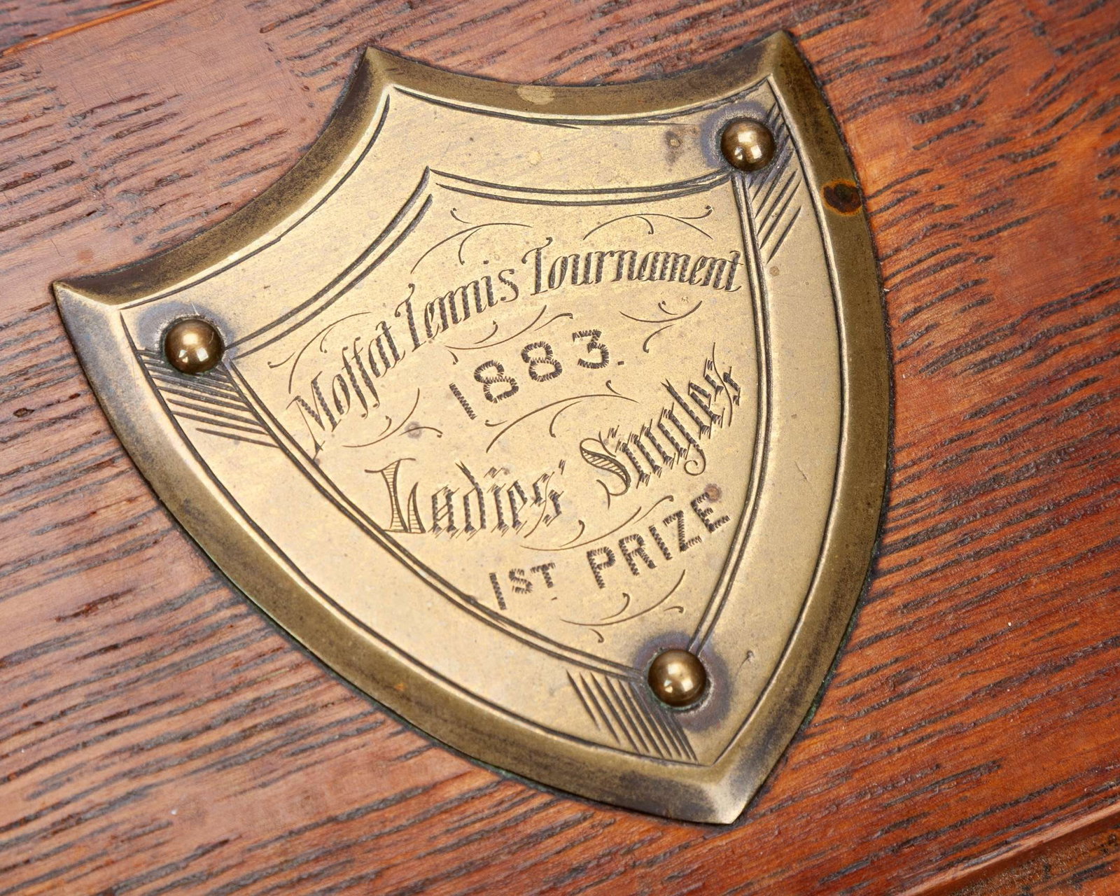 A first prize for the “Moffat Tennis Tournament, Ladies' Singles, 1883 - 4