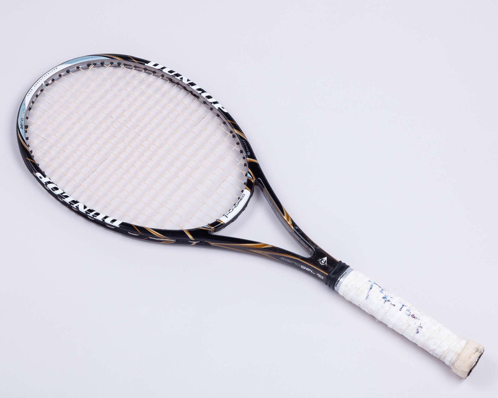 A Dunlop 1 Hundred tennis racket, the handle autographed by Bjorn Borg: A Dunlop 1 Hundred tennis racket, the handle autographed by Bjorn Borg, the grip and autographed rubbed and perishing It understood the racket was used by Borg in an exhibition/practise/private 