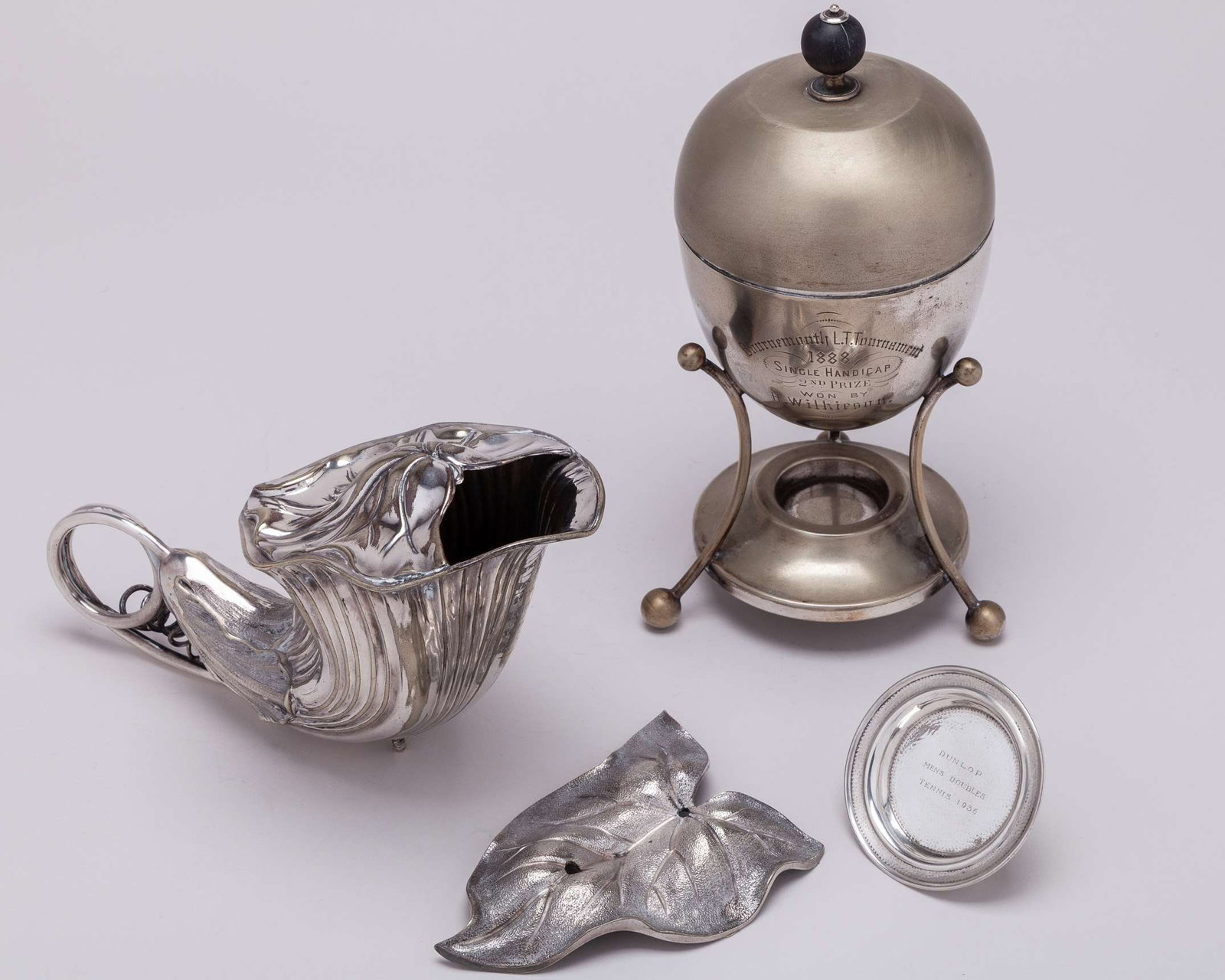 A Gentlemen's Open Doubles 2nd Prize trophy, 1894: A Gentlemen's Open Doubles 2nd Prize trophy, 1894, modelled as a spoon warmer, inscribed Gentlemen's Open Doubles 2nd Prize, 1894, foot detached, Bournemouth L.T. Tournament Single Handicap 2nd Prize,