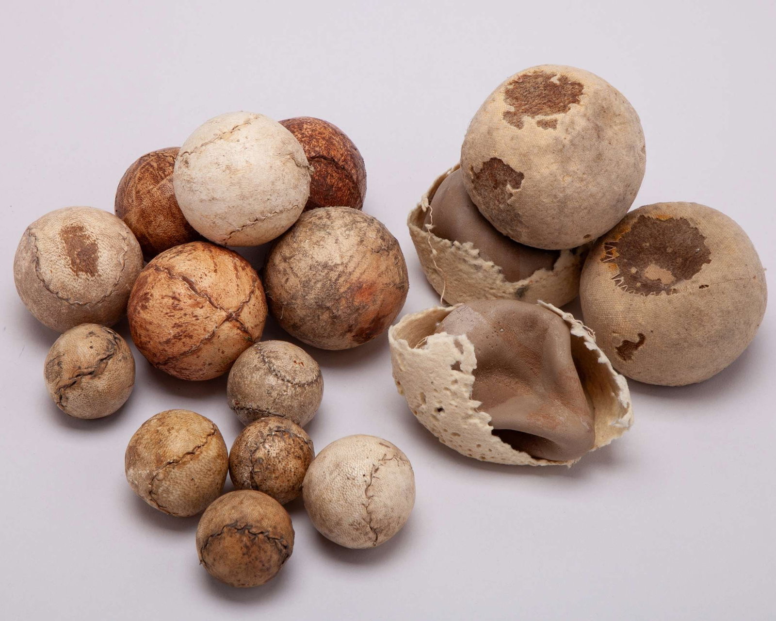 Four early lawn tennis balls and twelve leather jeu de paume tennis balls (1 of 4)