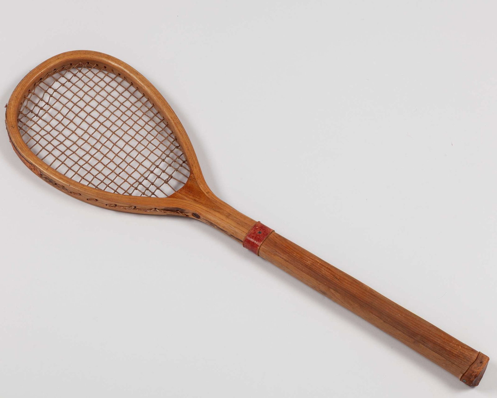 An early and attractive un-named tilt-headed Lawn Tennis racquet (1 of 10)