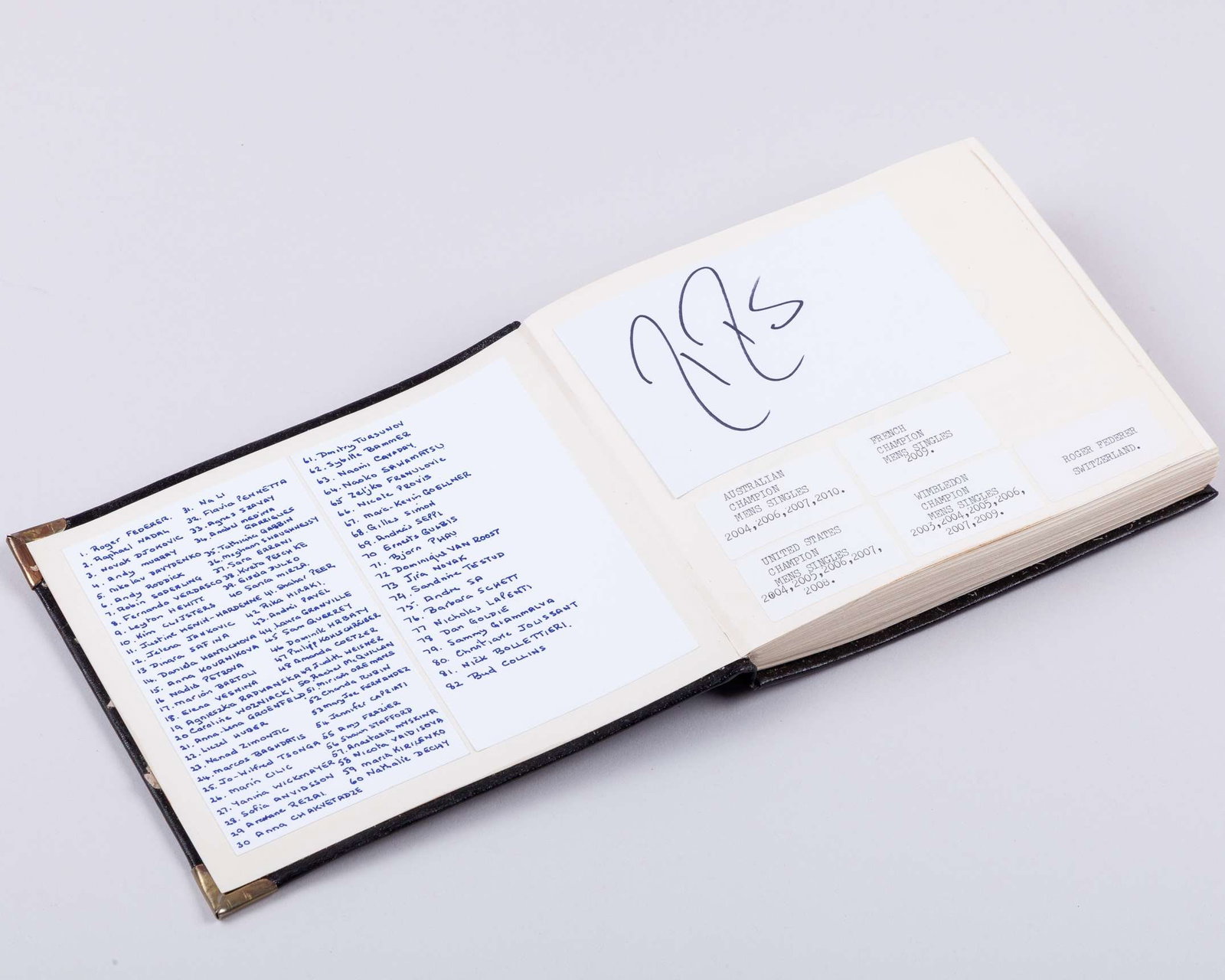 A tennis autograph album, 82 pages of notable champions: A tennis autograph album, 82 pages of notable champions indexed on the first page, collected on index cards and laid down or cut & pasted from other autograph albums or sources, organised on right han
