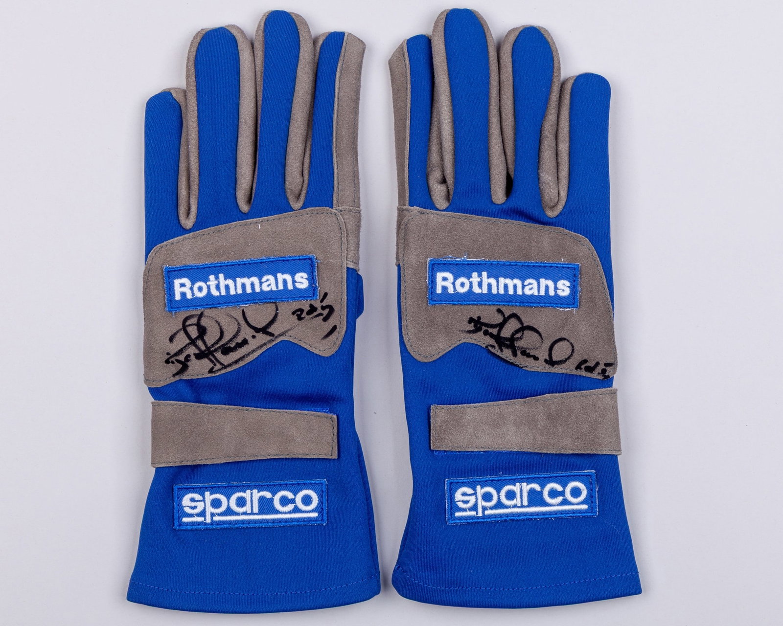 Nigel Mansell 1994 Williams Renault Signed ?Last Win? Replica Gloves: Nigel Mansell 1994 Williams Renault Signed ?Last Win? Replica Gloves.These are a pair of 1994 Williams Renault ?Last Win? Replica Gloves signed by the 1992 F1 World Champion, Nigel Mansell.