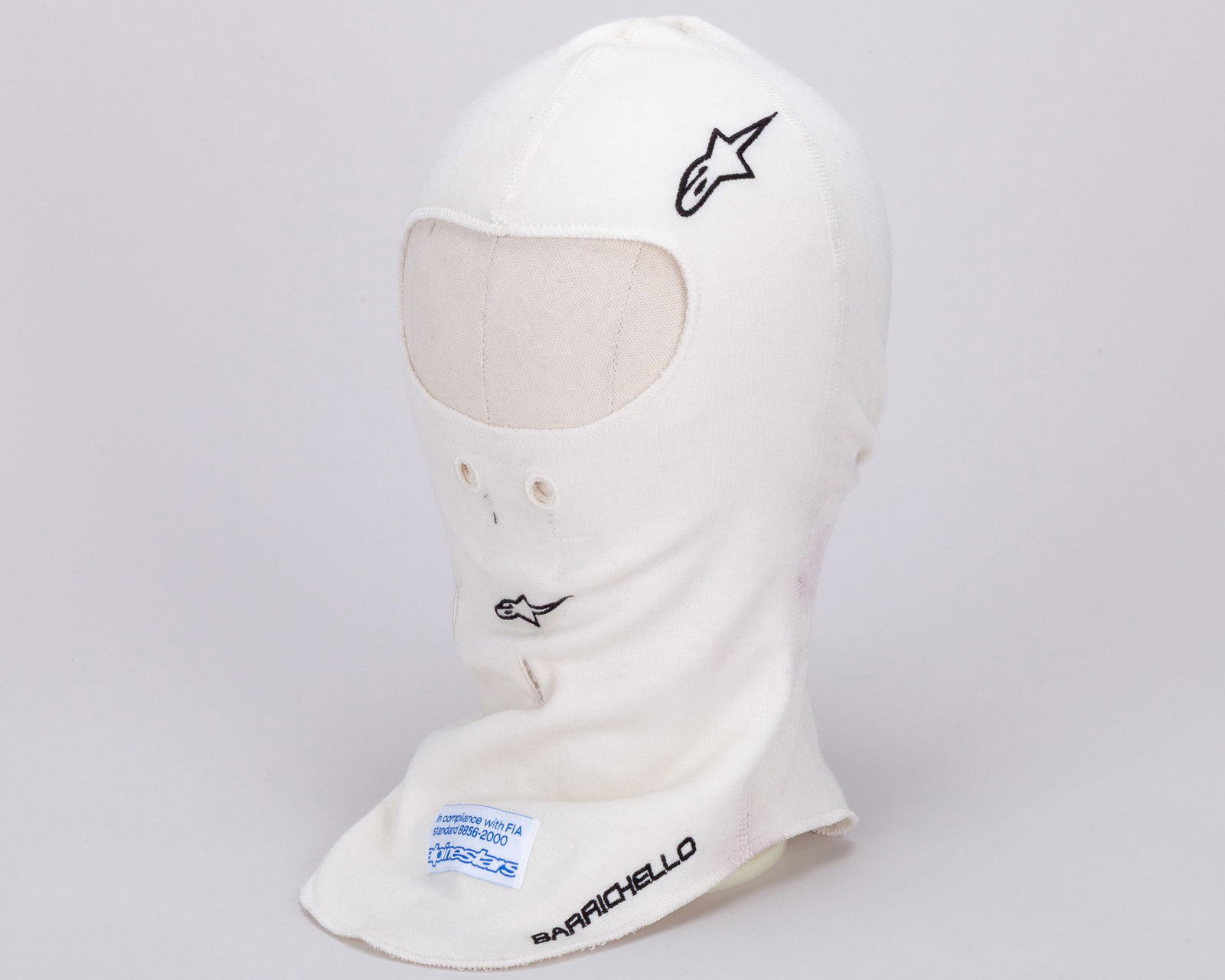 Rubens Barrichello 2009 Brawn GP Used Balaclava: Rubens Barrichello 2009 Brawn GP Used Balaclava.This balaclava was worn by F1 favourite Rubens Barrichello, during the 2009 Formula One World Championship. It was an iconic season for the Brawn GP tea