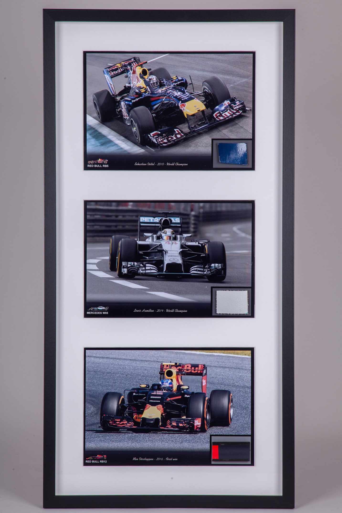 Lewis Hamilton, Max Verstappen & Sebastian Vettel Framed Car Parts with Photo's: Lewis Hamilton, Max Verstappen & Sebastian Vettel Framed Car Parts with Photo's.This framed set includes car parts from Hamilton's first Mercedes Championship winning car, Verstappen's first Red Bull 