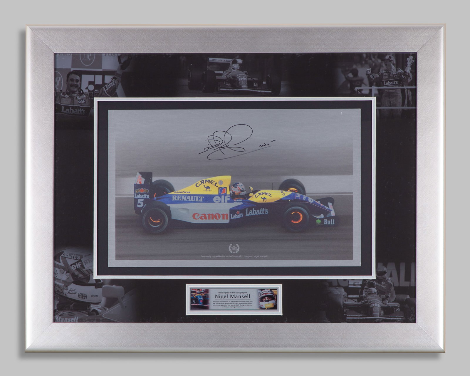 Nigel Mansell Signed Williams Renault Framed Photo: Nigel Mansell Signed Williams Renault Framed Photo.The photo is hand signed by the 1992 F1 World Champion. Professionally mounted and framed with a detailed plaque description.Complete with a certific