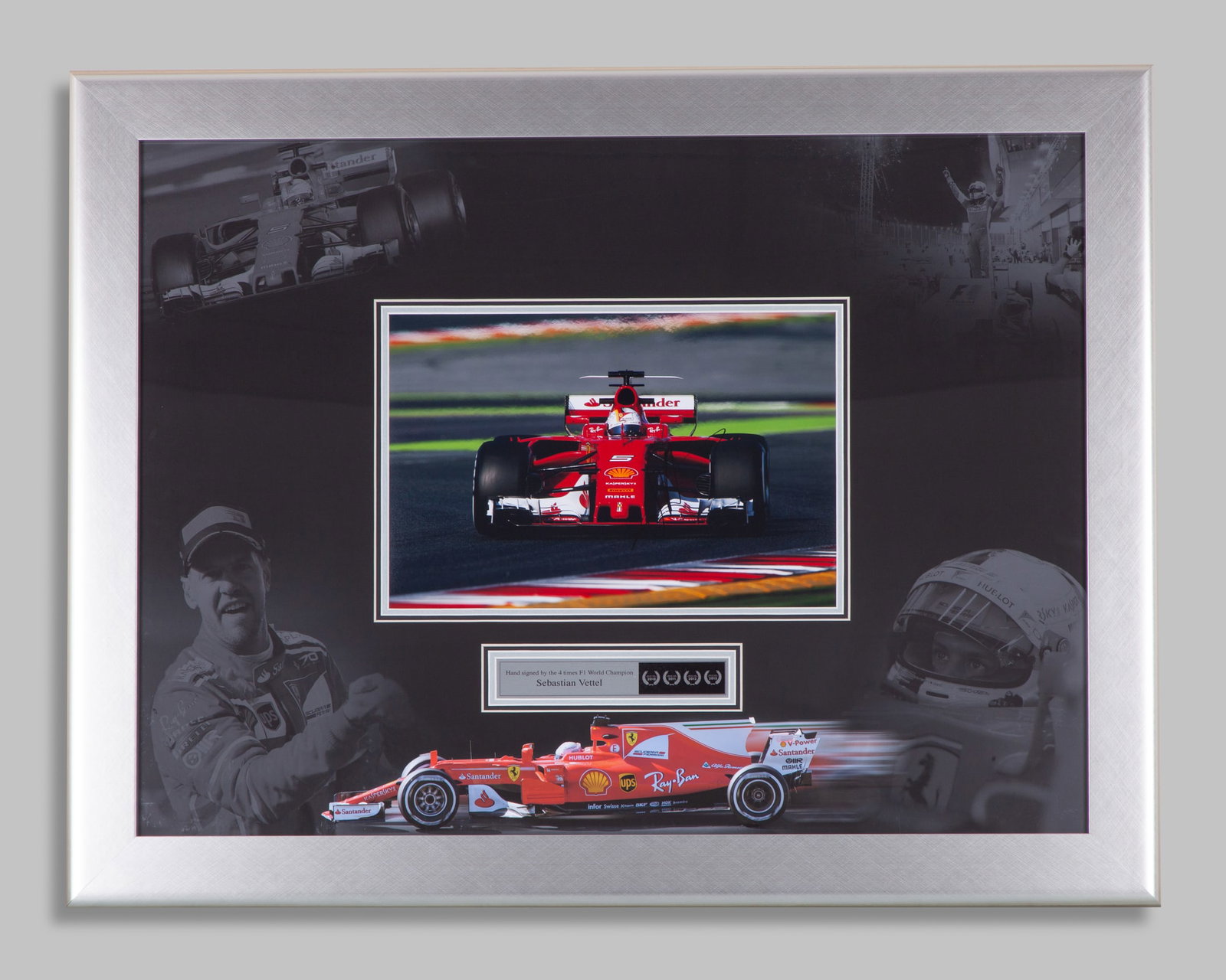 Sebastian Vettel Signed Ferrari Framed Photo: Sebastian Vettel Signed Ferrari Framed Photo.The Ferrari photo is hand signed by the 4-time F1 World Champion. Professionally mounted and framed with a plaque description.The frame measures 91cm lengt