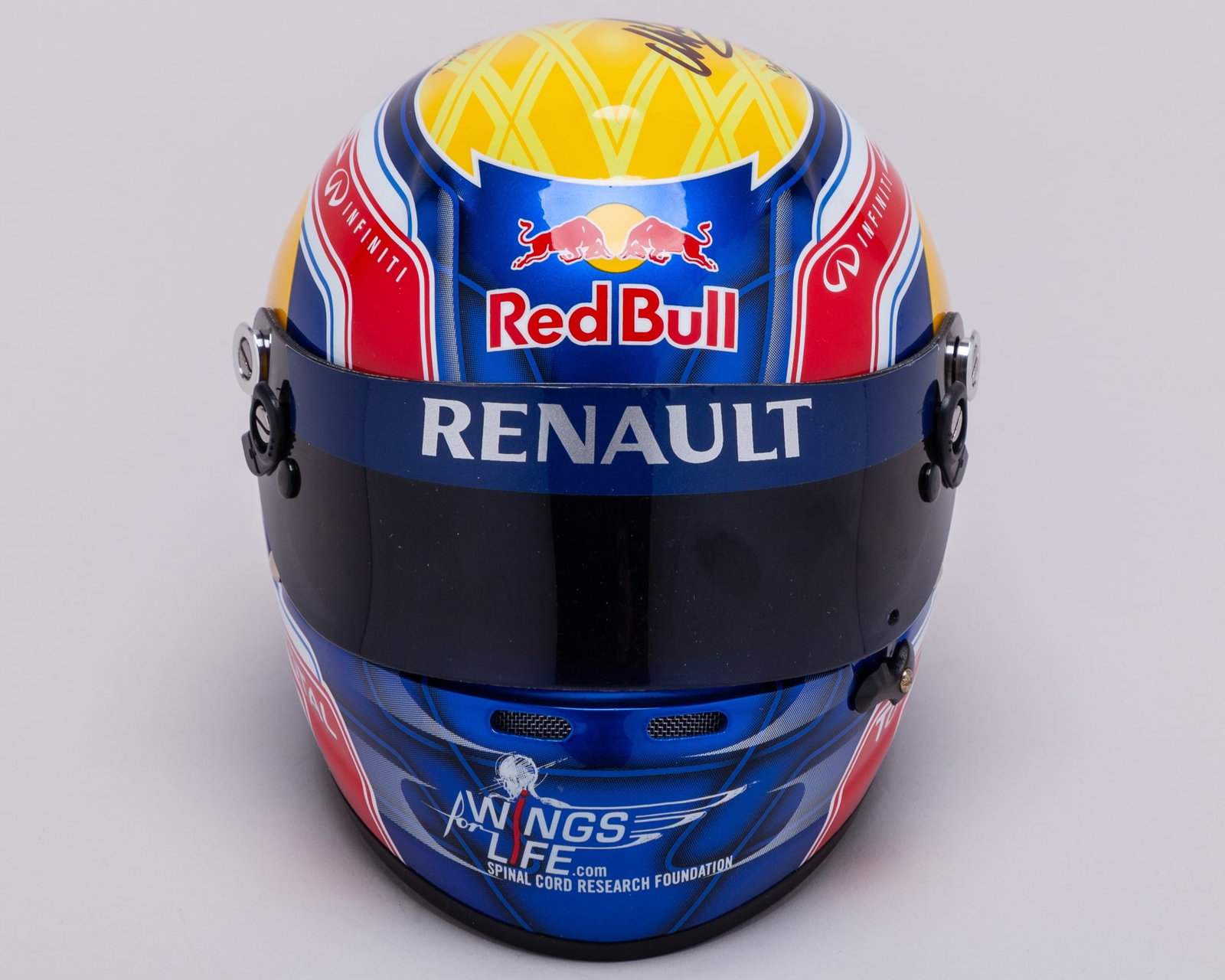 Mark Webber 2013 Signed Red Bull Racing 1:2 Scale Arai Helmet: Mark Webber 2013 Signed Red Bull Racing 1:2 Scale Arai Helmet.This 2013 Red Bull Racing 1:2 Scale Arai Helmet has been personally signed by F1 fan favourite Mark Webber.Complete in the original helmet