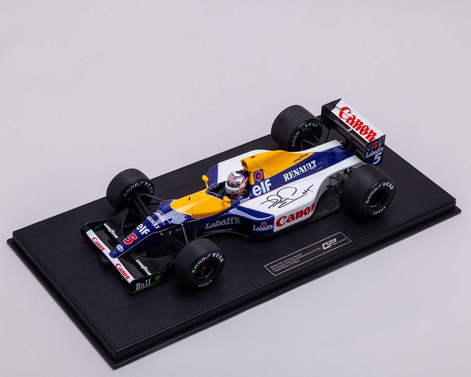 Nigel Mansell Signed 1992 British Grand Prix Limited Edition 1:12 Scale Model Car: Nigel Mansell Signed 1992 British Grand Prix Limited Edition 1:12 Scale Model Car.The model car represents Nigel's iconic Williams Renault FW14B from the 1992 British Grand Prix. Nigel claimed the rac