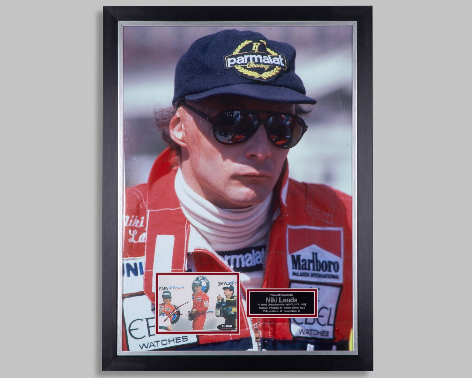 Niki Lauda Signed McLaren Framed Photo Display: Niki Lauda Signed McLaren Framed Photo Display.1 of the photo's has been personally signed by the 3-time F1 World Champion. Accompanied with a background photo and plaque description.Complete with a c
