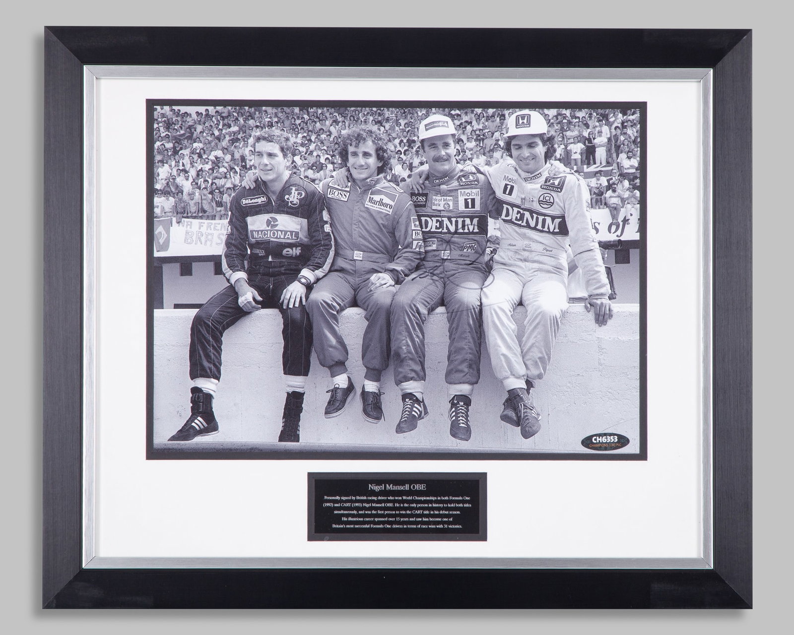 Nigel Mansell Signed Photo Display: Nigel Mansell Signed Photo Display.The photo has been personally signed by the 1992 F1 World Champion. Accompanied with a plaque description.Complete with a certificate of authenticity.The frame measu