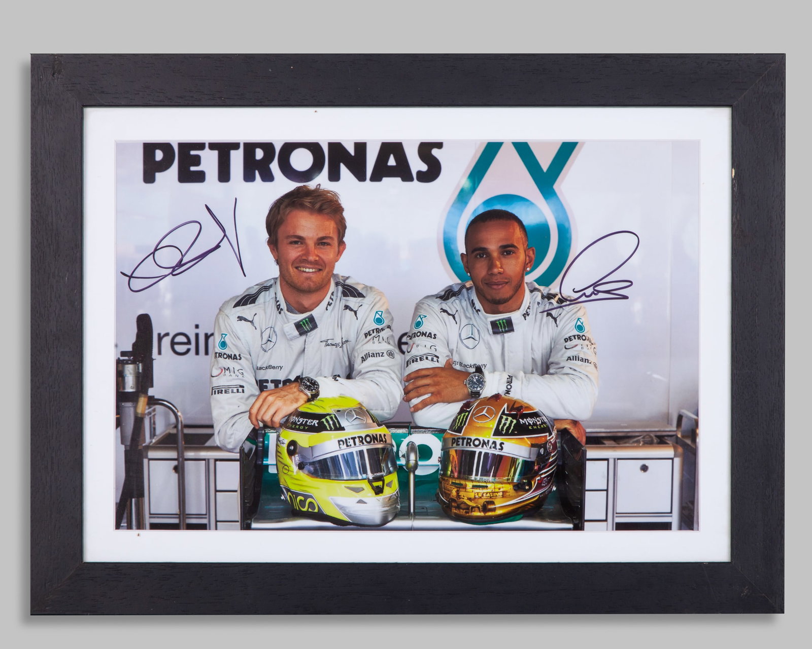 Lewis Hamilton & Nico Rosberg Signed Mercedes GP Petronas Formula One Team Framed Photo: Lewis Hamilton & Nico Rosberg Signed Mercedes GP Petronas Formula One Team Framed Photo.This photo has been personally signed by F1 World Champions Lewis Hamilton, and Nico Rosberg.The frame measures 
