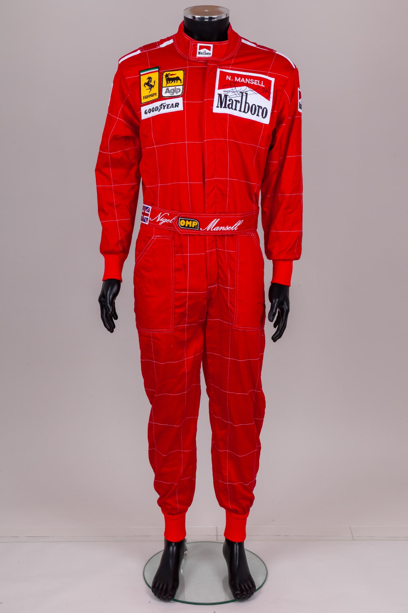 Nigel Mansell Signed Ferrari Replica Race Suit. (1 of 8)