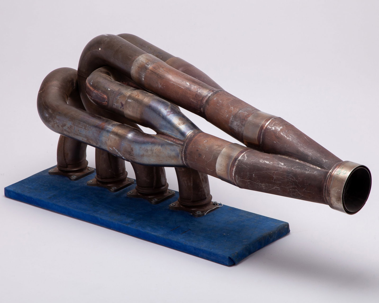 Benetton 1989 B191 Used Exhaust Manifold: Benetton 1989 B191 Used Exhaust Manifold.This is a genuine used exhaust manifold from the Benetton B191 Formula One car.The Benetton B191 marked a pivotal period in the team?s evolution, bridging its 