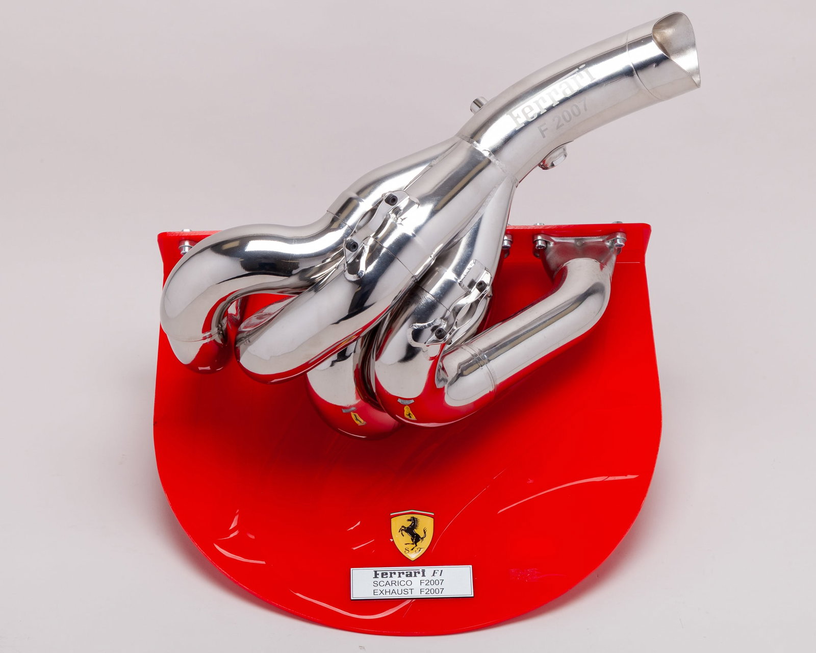 Ferrari 2007 Race Used Chromed Exhaust Display: Ferrari 2007 Race Used Chromed Exhaust Display.A fantastic display item, representing the year where Kimi Raikkonen claimed the Drivers' World Championship and Ferrari secured the Constructors World C