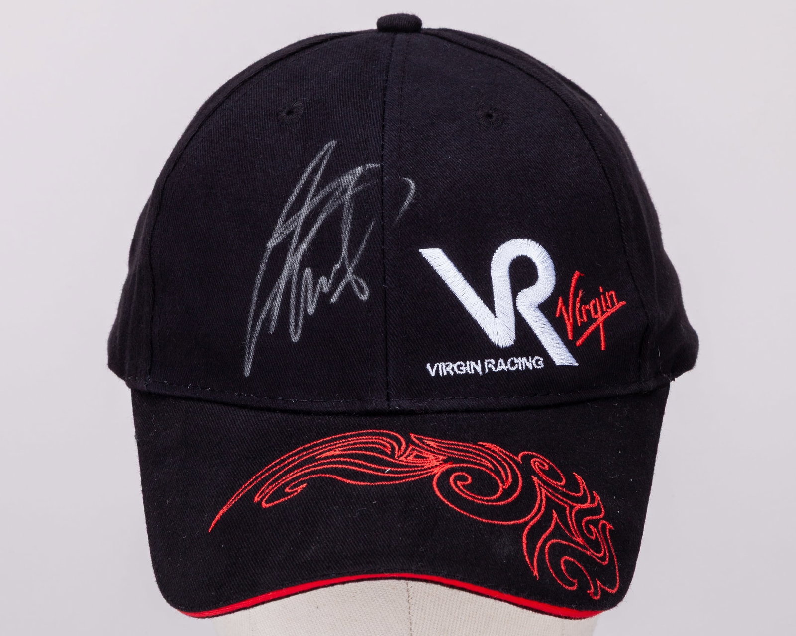 Timo Glock Signed Virgin Racing Cap: Timo Glock Signed Virgin Racing Cap.This Virgin Racing cap has been personally autographed by Timo Glock.