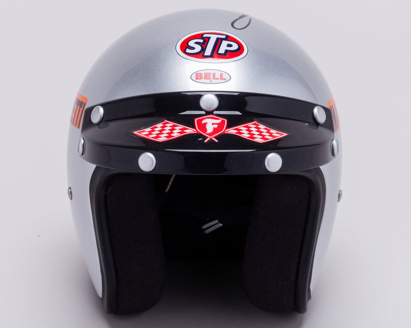 Mario Andretti 1969 Signed Lotus 1:2 Scale Bell Helmet: Mario Andretti 1969 Signed Lotus 1:2 Scale Bell Helmet.This 1969 Lotus 1:2 Scale Bell Helmet has been personally signed by the 1978 F1 World Champion.Complete in the original Bell Helmet box.