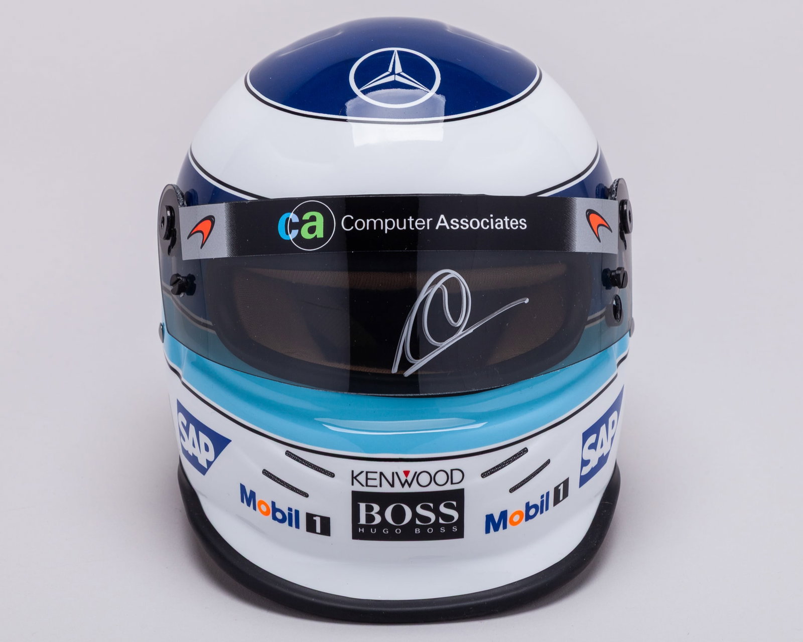 Mika Hakkinen 2001 Signed McLaren 1:2 Scale Bell Helmet: Mika Hakkinen 2001 Signed McLaren 1:2 Scale Bell Helmet.This 1:2 scale Bell Helmet has been personally signed by 2-time F1 World Champion Mika Hakkinen.Complete in the original helmet box.